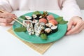 Meals, various types of maki sushi, philadelphia, maki, salmon, rice, salad. Delicious and healthy food Royalty Free Stock Photo