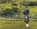 MEALTFALLS, SCOTLAND / UNITED KINDOM - AUGUST 19, 2016: Piper in traditional scottish kilt Royalty Free Stock Photo