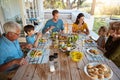 Mealtime together is just better. a family enjoying a meal together at home. Royalty Free Stock Photo