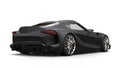 Mean matte black super sports car - back view Royalty Free Stock Photo