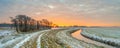 Meandering River in Frozen grassland landscape