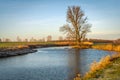 Meandering stream through a Dutch polder landscape Royalty Free Stock Photo