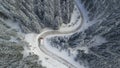 Meandering Winter Mountain Road with a Truck