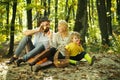 Meaning of happy family. United with nature. Family day concept. Happy family with kid boy relaxing while hiking in