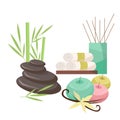 Means for spa treatments and relaxation - stones, scented candles, vanilla and bamboo, towels.