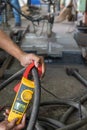 Measure amps while welding with digital clamp meter