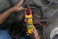 Measure amps while welding with digital clamp meter