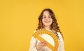 Measure angles in degrees. School lessons. Adorable cute pupil. She loves studying. Small girl holding protractor for Royalty Free Stock Photo