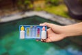 Measurement of chlorine and PH of a pool Royalty Free Stock Photo
