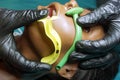 Measurement of nasopharyngeal and Oropharyngeal Airway tubes by stuff in a black gloves on a simulation mannequin dummy during Royalty Free Stock Photo