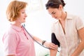 Measuring blood-pressure Royalty Free Stock Photo