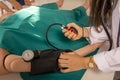 Measuring blood pressure with a sphygmomanometer. Close-up shot