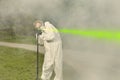 Measuring of bullet trajectory with ballistics trajectory laser and smoke on crime scene