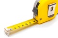 Measuring and calculating instruments - yellow ruler on white Royalty Free Stock Photo