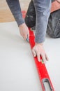 Measuring and cutting gypsum plasterboard Royalty Free Stock Photo