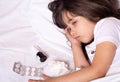 Measuring fever of sick child. Kids flu treatments. Royalty Free Stock Photo