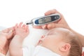 Measuring glucose level blood test from diabetes patient child b