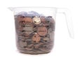 Measuring jug of sterling english money Royalty Free Stock Photo