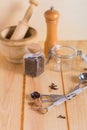 Measuring spoons and other kitchen utensils with different  spices Royalty Free Stock Photo