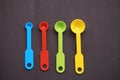 Measuring spoons in yellow  red  blue and green colors Royalty Free Stock Photo