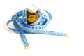 Measuring tape and container with tablets Royalty Free Stock Photo