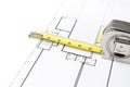 Measuring Tape on Floor Plans Royalty Free Stock Photo