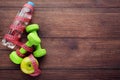 Measuring tape with apples, dumbbells and bottle