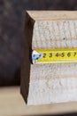 Measuring tape measure on the long board Royalty Free Stock Photo