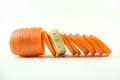 Measuring tape and sliced carrots