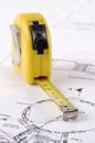 A measuring tape on a technical drawing Royalty Free Stock Photo