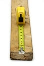 Measuring tape on wood Royalty Free Stock Photo