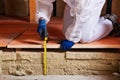Measuring the thickness of thermal insulation Royalty Free Stock Photo