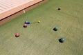 Measuring for the winner in bocce Royalty Free Stock Photo
