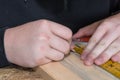 Measuring wood with joiners angle - close-up
