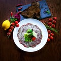 Meat antipasti on a table with decoration