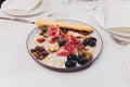 Meat appetizer selection. Salami, prosciutto, bread sticks, baguette, olives and sun-dried tomatoes, selective focus. Royalty Free Stock Photo
