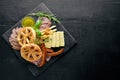 Meat assorted and cold appetizers. Ukrainian style. On a wooden background.