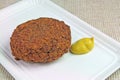 Meat Ball with Mustard on Paper Plate Royalty Free Stock Photo