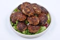 Meat balls and with salad on a plate Royalty Free Stock Photo