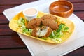 Meat Cheese Kubbe or Meat Cheese Kibbe with salad and dip served in dish isolated on table side view of middle east food Royalty Free Stock Photo