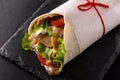 Doner kebab or shawarma sandwich on black slate background. Royalty Free Stock Photo