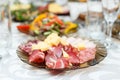 Meat cold cuts on a banquet table Royalty Free Stock Photo