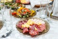 Meat cold cuts on a banquet table