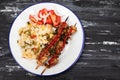 Meat and Cooked white rice mixed with colorful vegetables onion, green beans, tomato Royalty Free Stock Photo