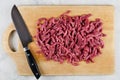 Meat for cooking stir fry on cutting board