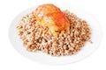 meat cutlet with gravy and buckwheat porridge Royalty Free Stock Photo