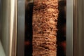 A stick of Arab shwarma in front of the grill Royalty Free Stock Photo