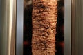 A stick of Arab shwarma in front of the grill Royalty Free Stock Photo