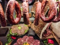 Meat Department in the butcher shop inside the restaurant. Various types of meat are presented in an orderly and creative way. Royalty Free Stock Photo