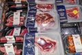 Meat department in a supermarket. Beef meat in vacuum packaging.